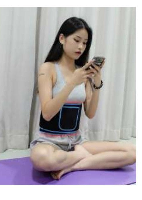 Woman relaxing while wearing the red light therapy belt